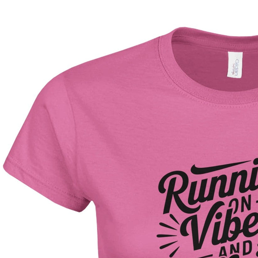 Women’s fitted “Running on Vibes” T-shirt, soft lightweight fabric, curved silhouette, light neutral color.