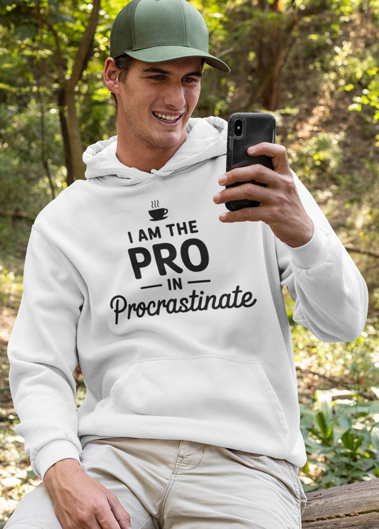 I am the Pro in Procrastinate pullover hoodie, minimalist black text, playful coffee cup icon, unisex casual