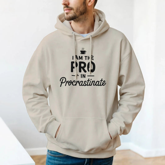 I am the Pro in Procrastinate pullover hoodie, minimalist black text, playful coffee cup icon, unisex casual